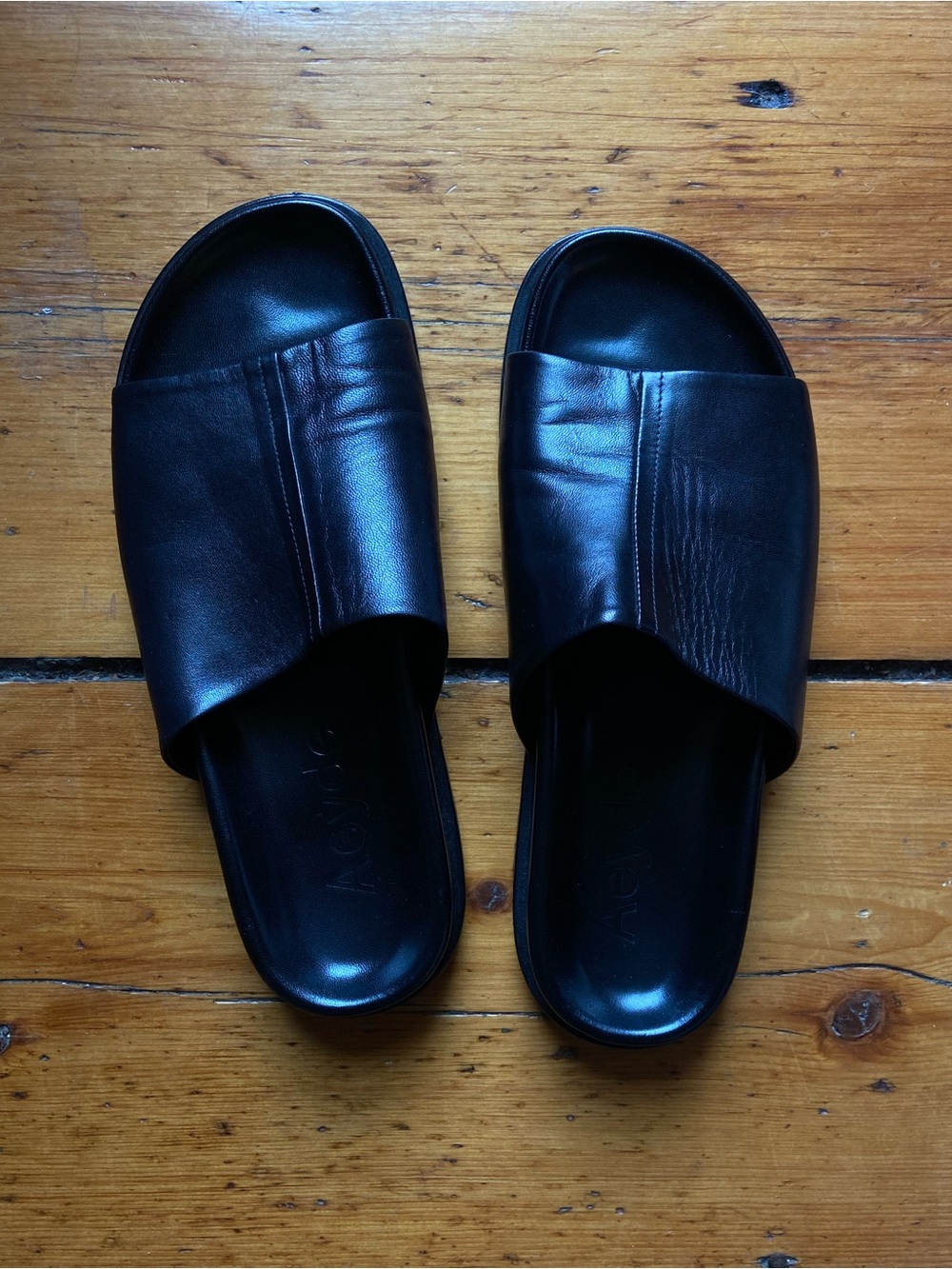 Aeyde black nappa leather slides